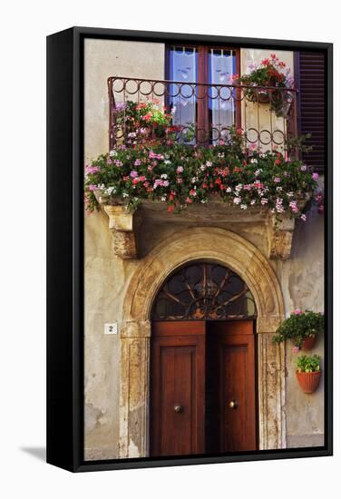 Balcony Flowers and Doorway in Pienza Tuscany Italy-Julian Castle-Framed Stretched Canvas