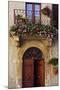 Balcony Flowers and Doorway in Pienza Tuscany Italy-Julian Castle-Mounted Photo