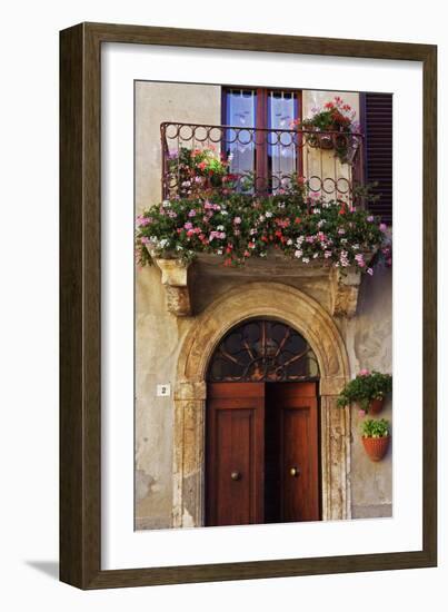 Balcony Flowers and Doorway in Pienza Tuscany Italy-Julian Castle-Framed Photo