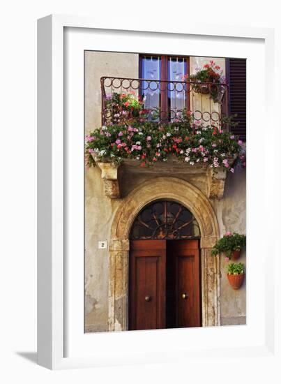 Balcony Flowers and Doorway in Pienza Tuscany Italy-Julian Castle-Framed Photo