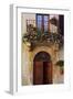 Balcony Flowers and Doorway in Pienza Tuscany Italy-Julian Castle-Framed Photo