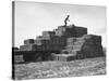 Baled Alfalfa in Large Stacks on Truck and on Ground in Imperial Valley-Hansel Mieth-Stretched Canvas