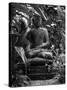 Bali, Ubud, a Statue of buddha Sits Serenely in Gardens-Niels Van Gijn-Stretched Canvas