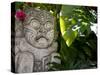 Bali, Ubud, a Stone Carving, Adorned with a Hibiscus Flower, Sits in Tropical Gardens-Niels Van Gijn-Stretched Canvas