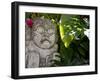 Bali, Ubud, a Stone Carving, Adorned with a Hibiscus Flower, Sits in Tropical Gardens-Niels Van Gijn-Framed Photographic Print