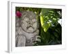 Bali, Ubud, a Stone Carving, Adorned with a Hibiscus Flower, Sits in Tropical Gardens-Niels Van Gijn-Framed Photographic Print