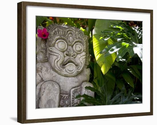 Bali, Ubud, a Stone Carving, Adorned with a Hibiscus Flower, Sits in Tropical Gardens-Niels Van Gijn-Framed Photographic Print