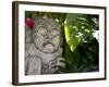 Bali, Ubud, a Stone Carving, Adorned with a Hibiscus Flower, Sits in Tropical Gardens-Niels Van Gijn-Framed Photographic Print