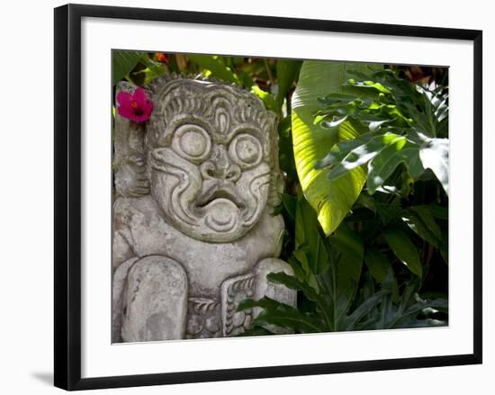 Bali, Ubud, a Stone Carving, Adorned with a Hibiscus Flower, Sits in Tropical Gardens-Niels Van Gijn-Framed Photographic Print