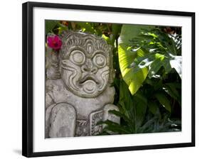 Bali, Ubud, a Stone Carving, Adorned with a Hibiscus Flower, Sits in Tropical Gardens-Niels Van Gijn-Framed Photographic Print