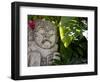 Bali, Ubud, a Stone Carving, Adorned with a Hibiscus Flower, Sits in Tropical Gardens-Niels Van Gijn-Framed Photographic Print