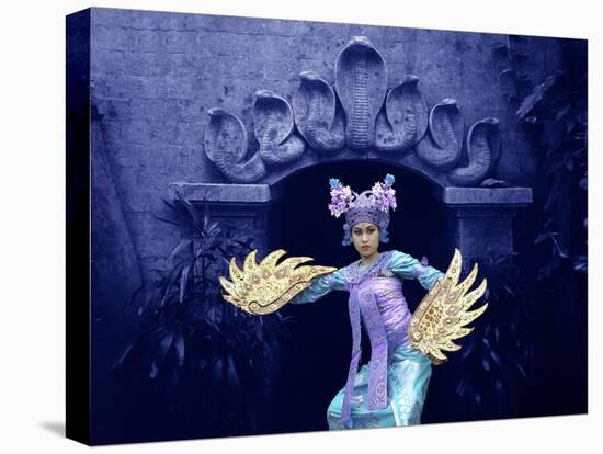 Balinese Dancer in Front of Temple in Ubud, Bali, Indonesia-Jim Zuckerman-Stretched Canvas