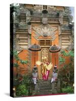 Balinese Dancer Wearing Traditional Garb Near Palace Doors in Ubud, Bali, Indonesia-Jim Zuckerman-Stretched Canvas