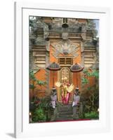 Balinese Dancer Wearing Traditional Garb Near Palace Doors in Ubud, Bali, Indonesia-Jim Zuckerman-Framed Photographic Print