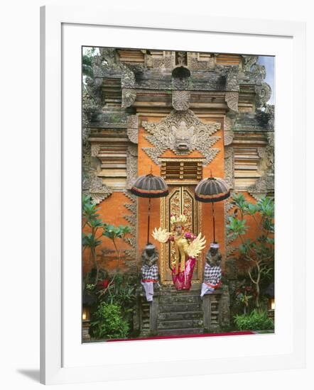 Balinese Dancer Wearing Traditional Garb Near Palace Doors in Ubud, Bali, Indonesia-Jim Zuckerman-Framed Photographic Print