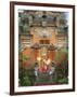 Balinese Dancer Wearing Traditional Garb Near Palace Doors in Ubud, Bali, Indonesia-Jim Zuckerman-Framed Photographic Print