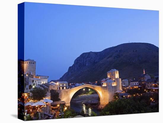 Balkans Bosnia Mostar Stari Most Peace Bridge on Neretva River Lit Up in the Evening-Christian Kober-Stretched Canvas