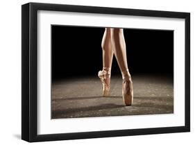 Ballerina Balancing En Pointe-null-Framed Art Print