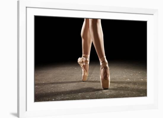 Ballerina Balancing En Pointe-null-Framed Art Print