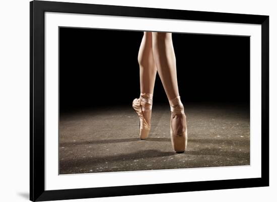 Ballerina Balancing En Pointe-null-Framed Art Print