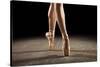 Ballerina Balancing En Pointe-null-Stretched Canvas