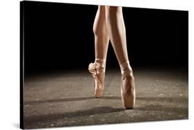 Ballerina Balancing En Pointe-null-Stretched Canvas