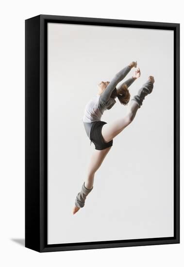 Ballerina Leaping in Mid-Air-null-Framed Stretched Canvas