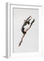 Ballerina Leaping in Mid-Air-null-Framed Photo