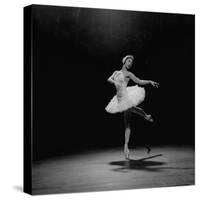 Ballerina Margot Fonteyn in White Costume Balanced on One Toe While Dancing Alone on Stage-Gjon Mili-Stretched Canvas