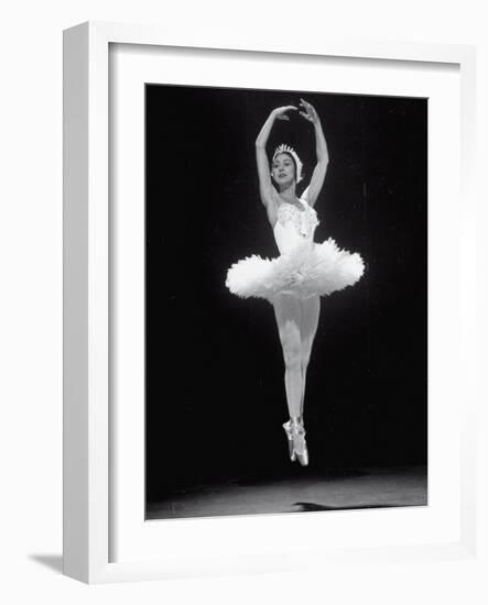 Ballerina Margot Fonteyn in White Costume Leaping into the Air While Dancing Alone on Stage-Gjon Mili-Framed Premium Photographic Print