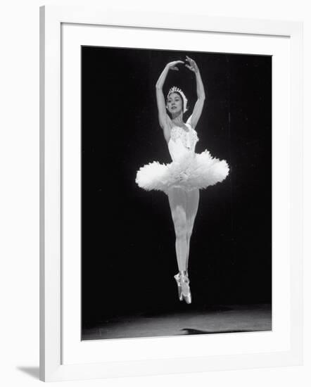 Ballerina Margot Fonteyn in White Costume Leaping into the Air While Dancing Alone on Stage-Gjon Mili-Framed Premium Photographic Print