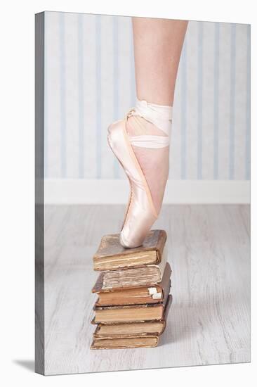 Ballerina Pointe on Old Books-null-Stretched Canvas