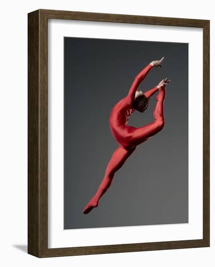 Ballet Dancer in Red Leotard-Erik Isakson-Framed Photographic Print