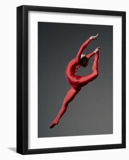 Ballet Dancer in Red Leotard-Erik Isakson-Framed Photographic Print