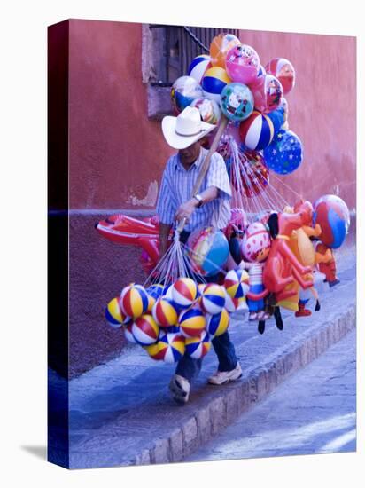 Balloon Vendor Walking the Streets, San Miguel De Allende, Mexico-Nancy Rotenberg-Stretched Canvas