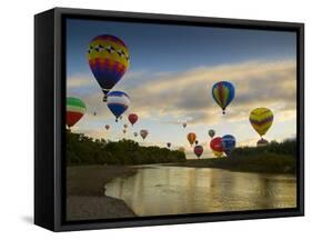 Balloons Soaring About Sandia Mountains and Rio Grande River During Albuquerque Balloon Fiesta-James Shive-Framed Stretched Canvas