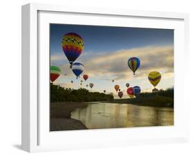 Balloons Soaring About Sandia Mountains and Rio Grande River During Albuquerque Balloon Fiesta-James Shive-Framed Photographic Print