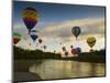 Balloons Soaring About Sandia Mountains and Rio Grande River During Albuquerque Balloon Fiesta-James Shive-Mounted Photographic Print