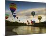 Balloons Soaring About Sandia Mountains and Rio Grande River During Albuquerque Balloon Fiesta-James Shive-Mounted Photographic Print