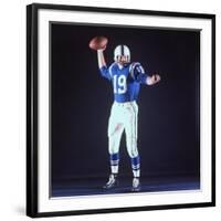 Baltimore Colts Football Player Johnny Unitas in Uniform While Holding Ball in Passing Stance-Yale Joel-Framed Premium Photographic Print