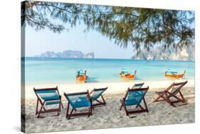 Bamboo Beach Chairs and Traditional Long-Tail Boats on Beautiful Bay of Koh Phi Phi Island Thailand-tupikov-Stretched Canvas