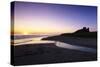 Bamburgh Castle at Sunrise, Bamburgh, Northumberland, England, United Kingdom, Europe-Markus Lange-Stretched Canvas