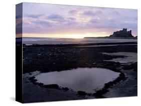 Bamburgh Castle at Sunrise, Bamburgh, Northumberland, England, United Kingdom-Lee Frost-Stretched Canvas