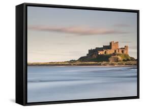 Bamburgh Castle Bathed in Golden Evening Light Overlooking Bamburgh Bay with the Sea Filling the Fo-Lee Frost-Framed Stretched Canvas