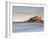 Bamburgh Castle Bathed in Golden Evening Light Overlooking Bamburgh Bay with the Sea Filling the Fo-Lee Frost-Framed Photographic Print