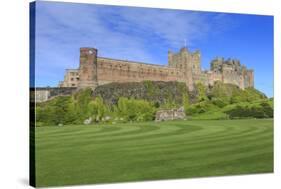 Bamburgh Castle under a Blue Summer Sky, Bamburgh, Northumberland, England, United Kingdom-Eleanor Scriven-Stretched Canvas