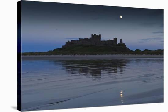 Bamburgh Castle under a Full Moon at Dusk in Summer, Bamburgh, Northumberland, England-Eleanor Scriven-Stretched Canvas