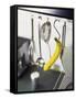 Banana and Kitchen Tools Hanging on Hooks in Kitchen-Kröger & Gross-Framed Stretched Canvas