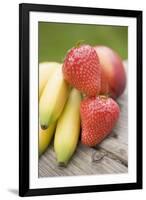 Bananas, Strawberries and Nectarine on Wooden Table-Foodcollection-Framed Photographic Print