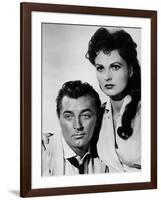 Bandido caballero by Richard Fleischer with Robert Mitchum and Ursula Thiess, 1956 (b/w photo)-null-Framed Photo